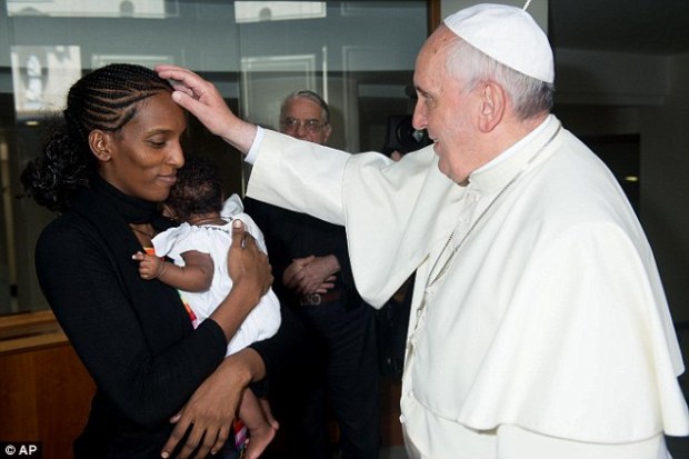 Meriam Ibrahim meets Pope Francis with her daughter Maya in her arms, in his Santa Marta residence, at the Vatican.