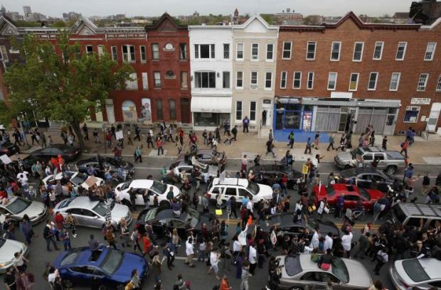 Demonstrators took to the streets in Baltimore, May 1st, 2015 same place where rioters clashed with police earlier in the week (photo: Reuters/Lucas Jackson)
