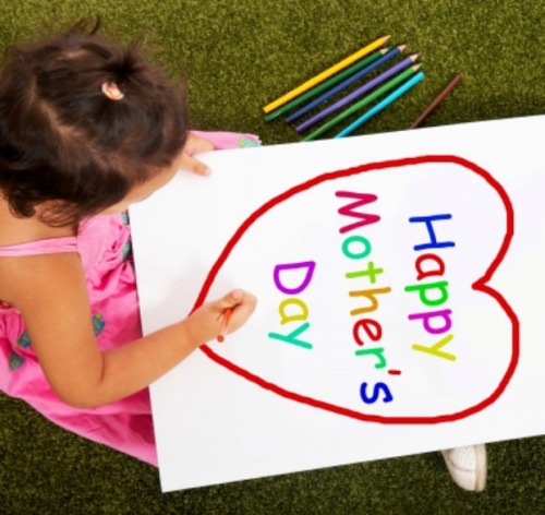 child writing happy mother's day