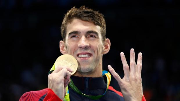 Michael Phelps with his gold medal at the 2016 Rio Olympics. (Photo credit - Clive Rose/Getty Images